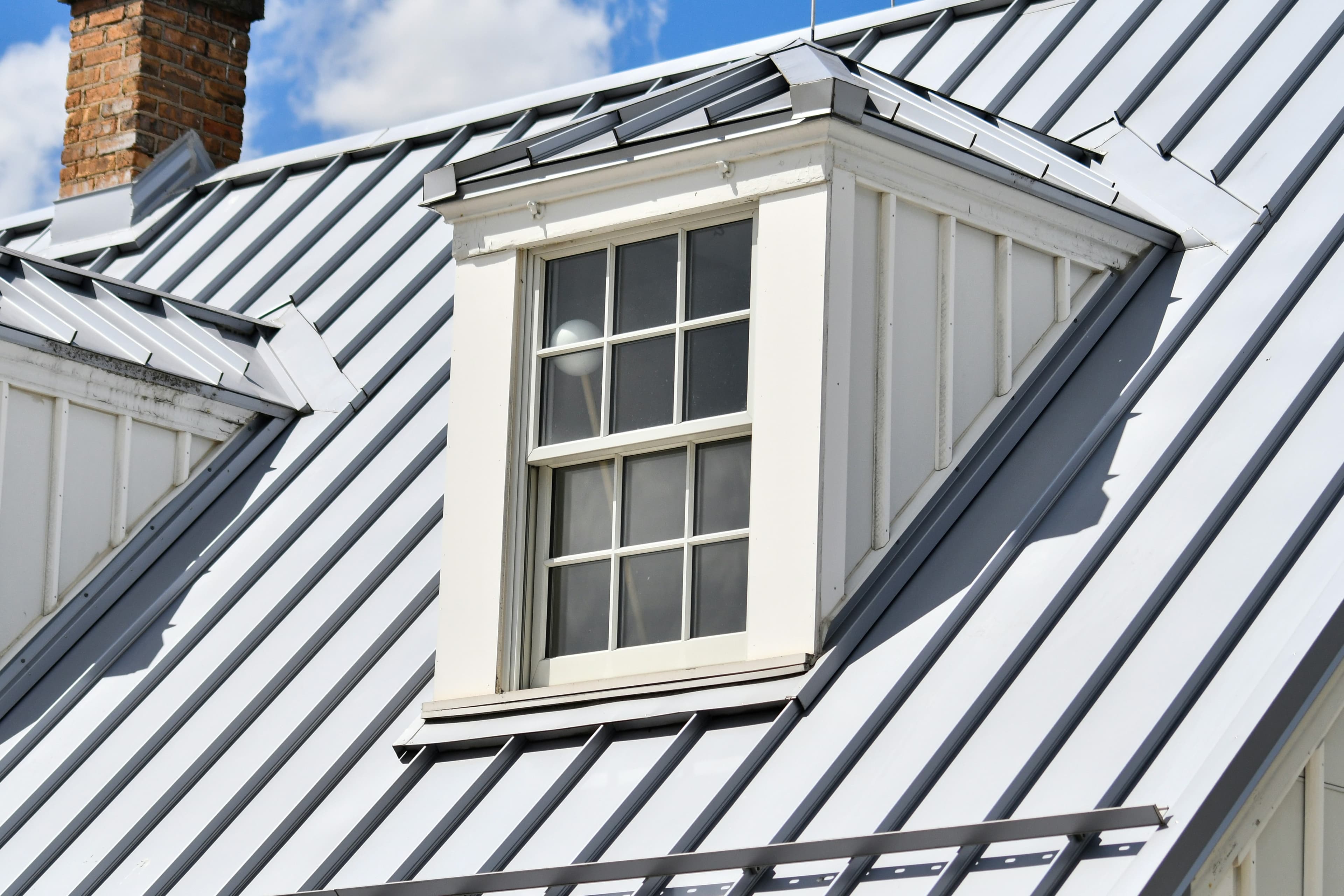 Residential metal roof flashing and dormer detail
